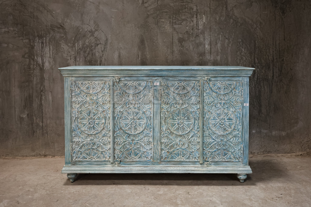 Vibrant sky blue carved sideboard.