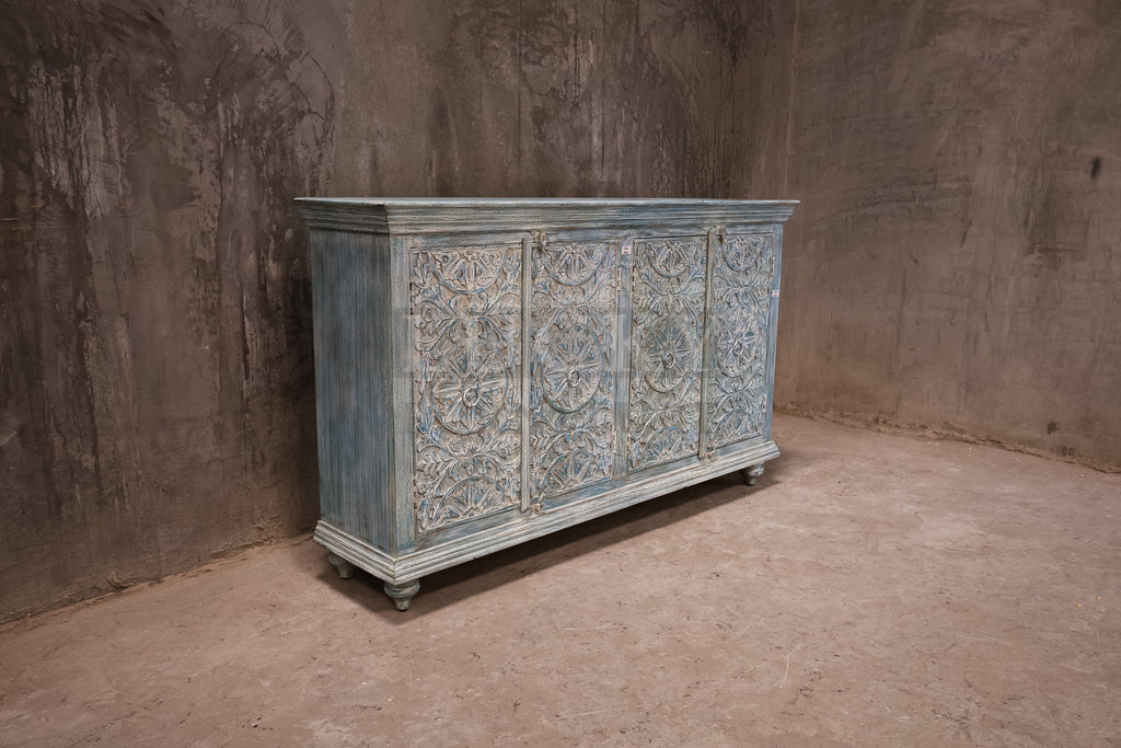 Vibrant sky blue carved sideboard.