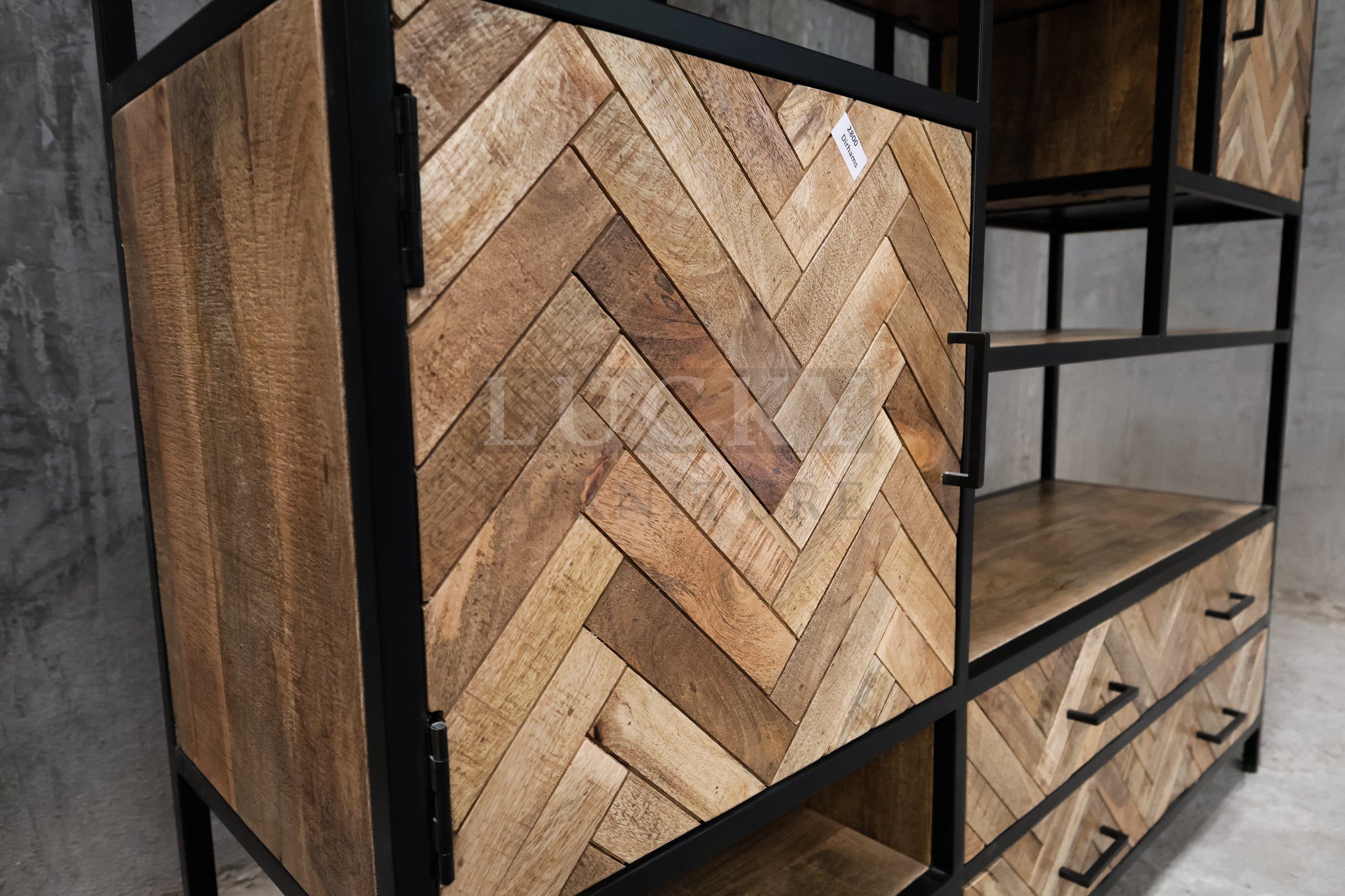 Herring bone mango wood and metal bookshelf.