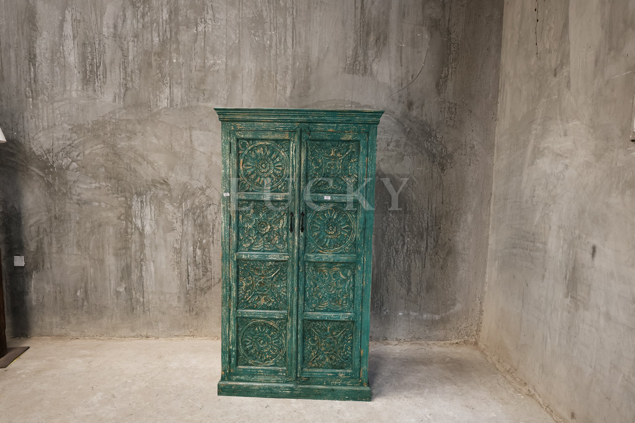 Carved vibrant cabinet.