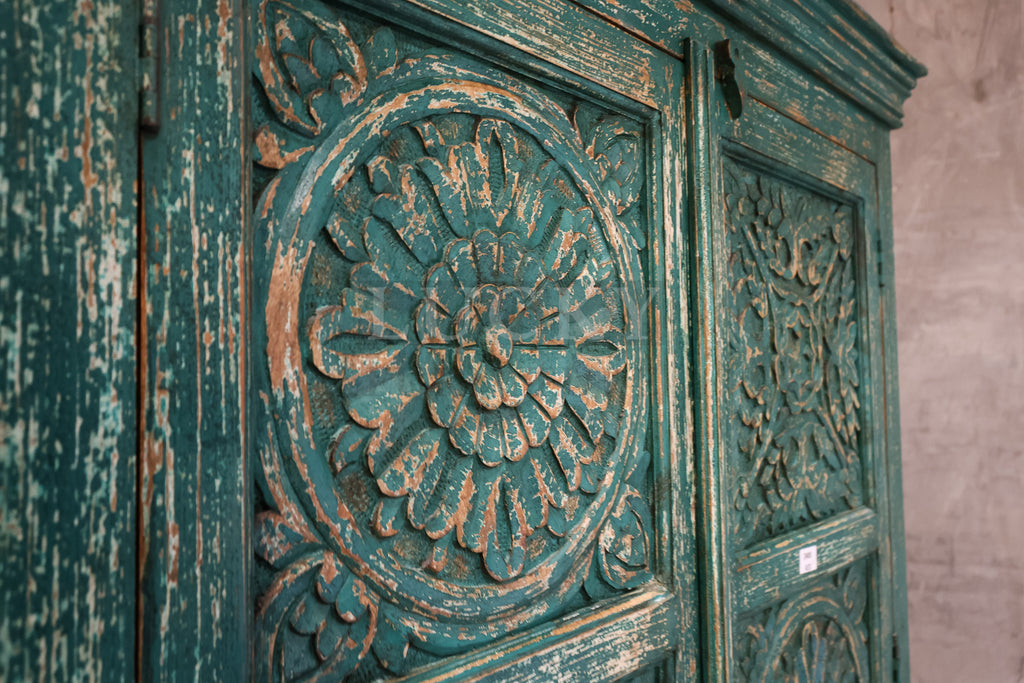 Carved vibrant cabinet.