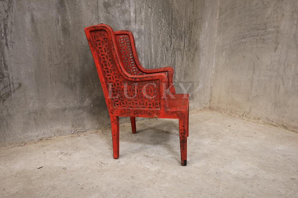 Red distressed statement chair.