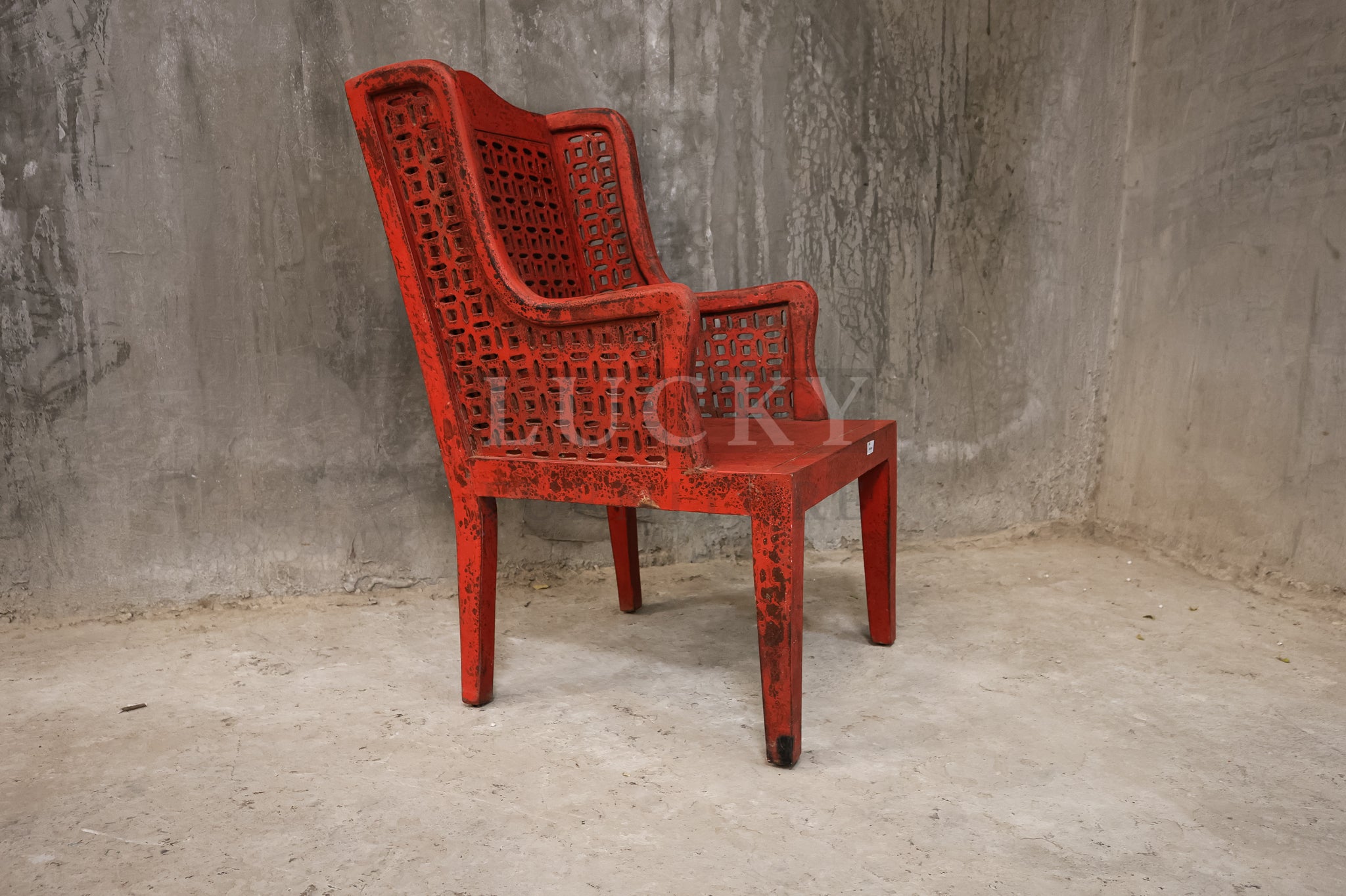 Red distressed statement chair.