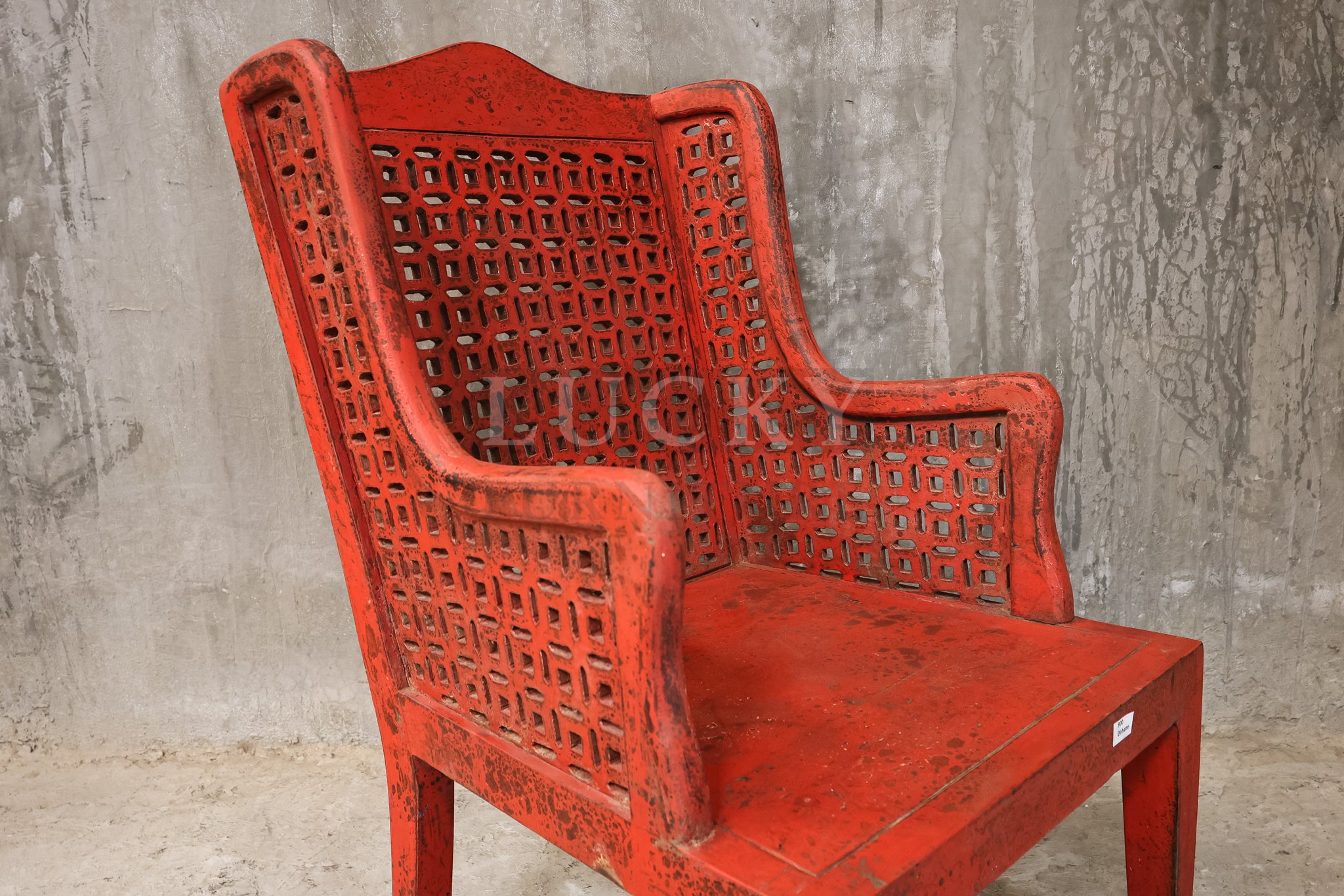Red distressed statement chair.