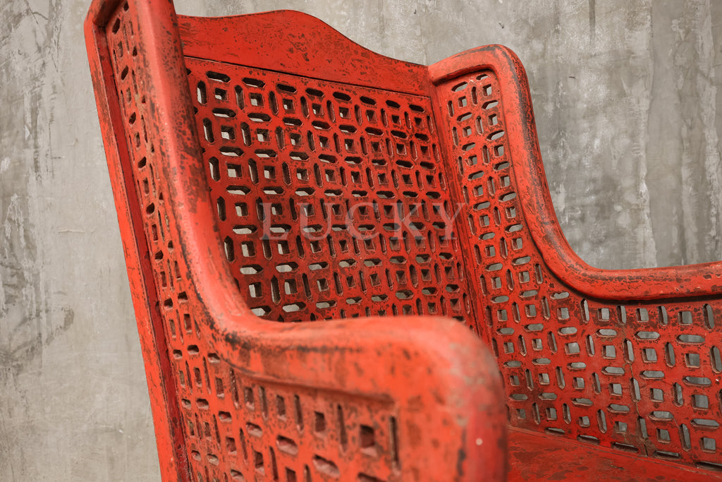 Red distressed statement chair.