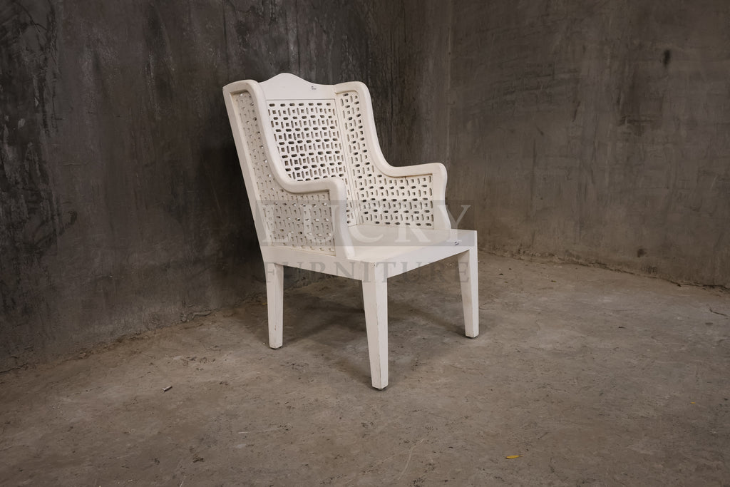 White distressed statement chair.