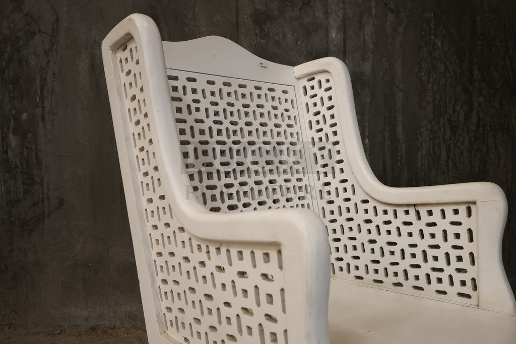 White distressed statement chair.