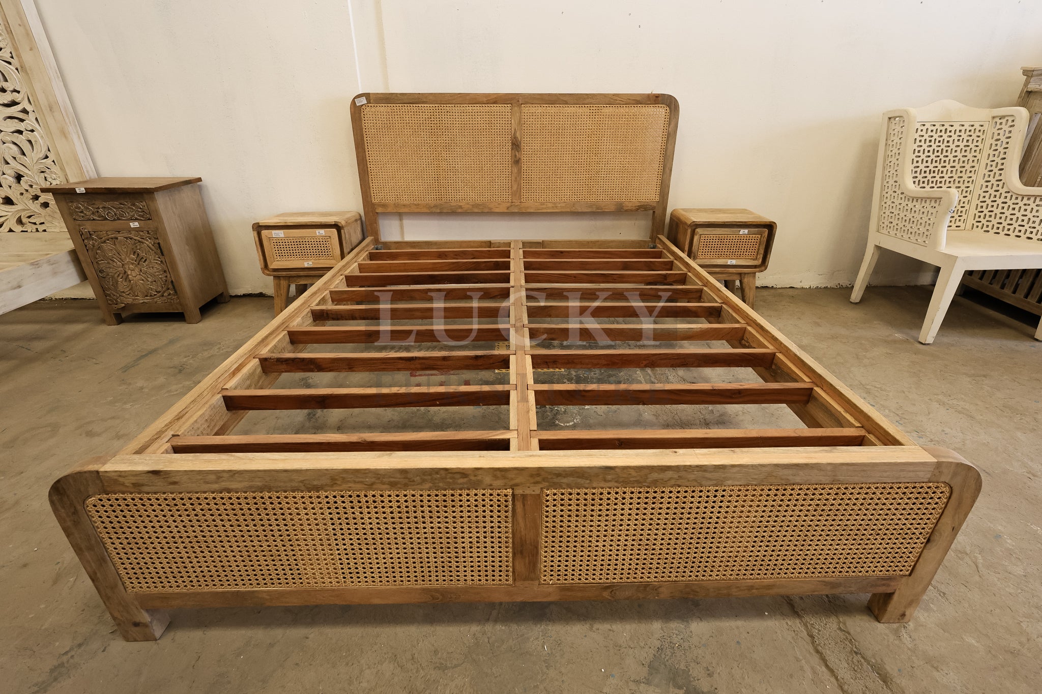 Rattan and mango wood bed.