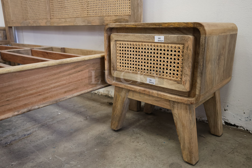 Rattan and mango wood bed.