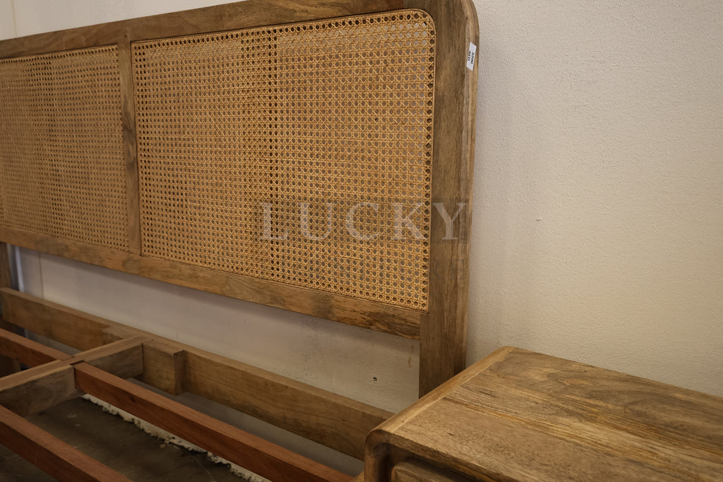 Rattan and mango wood bed.