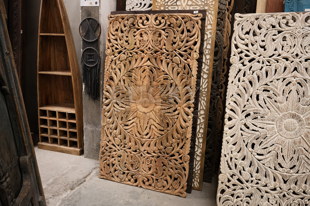 Carved wooden panel.
