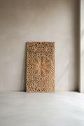 Carved wooden panel.
