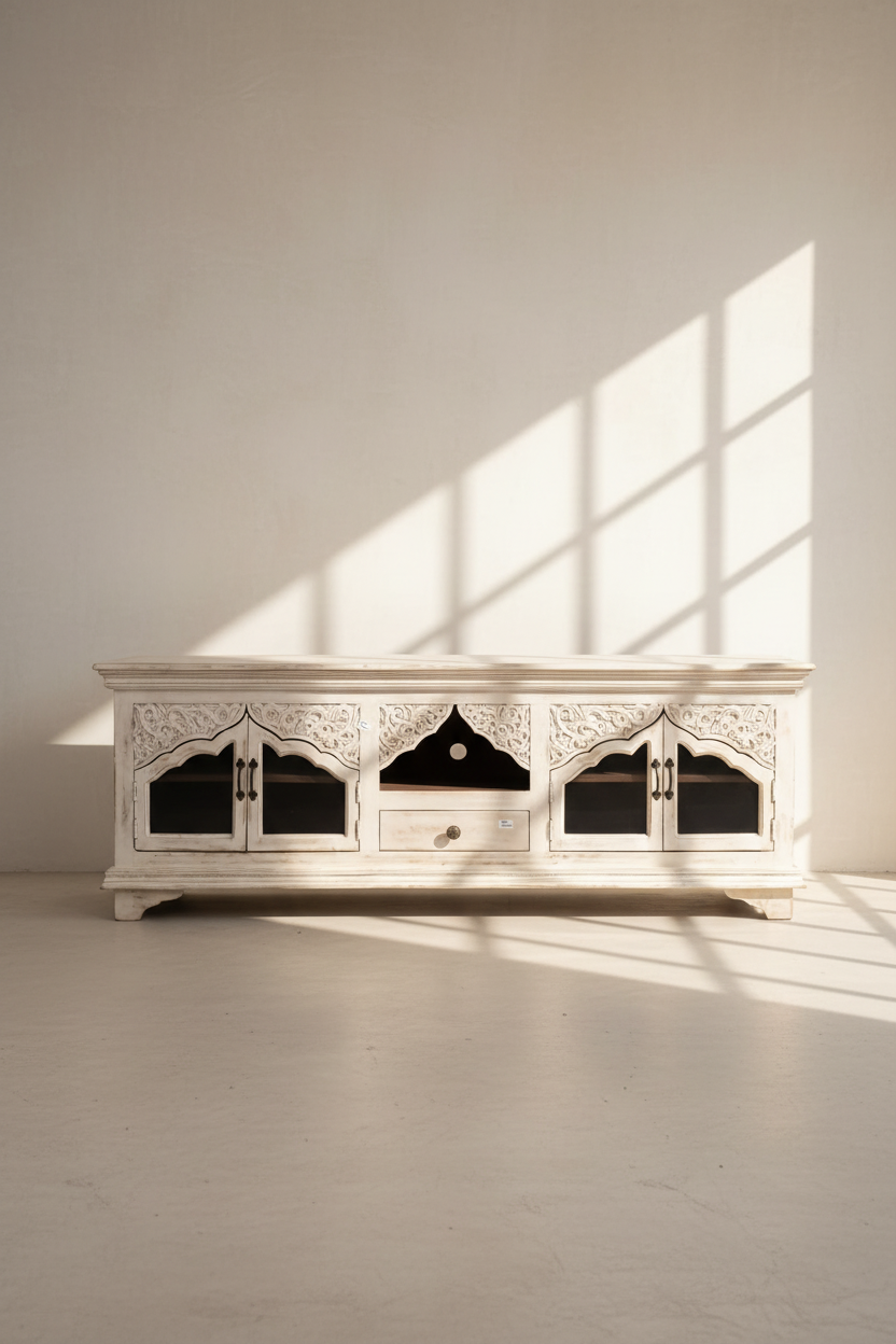 Carved whitewashed tv stand.