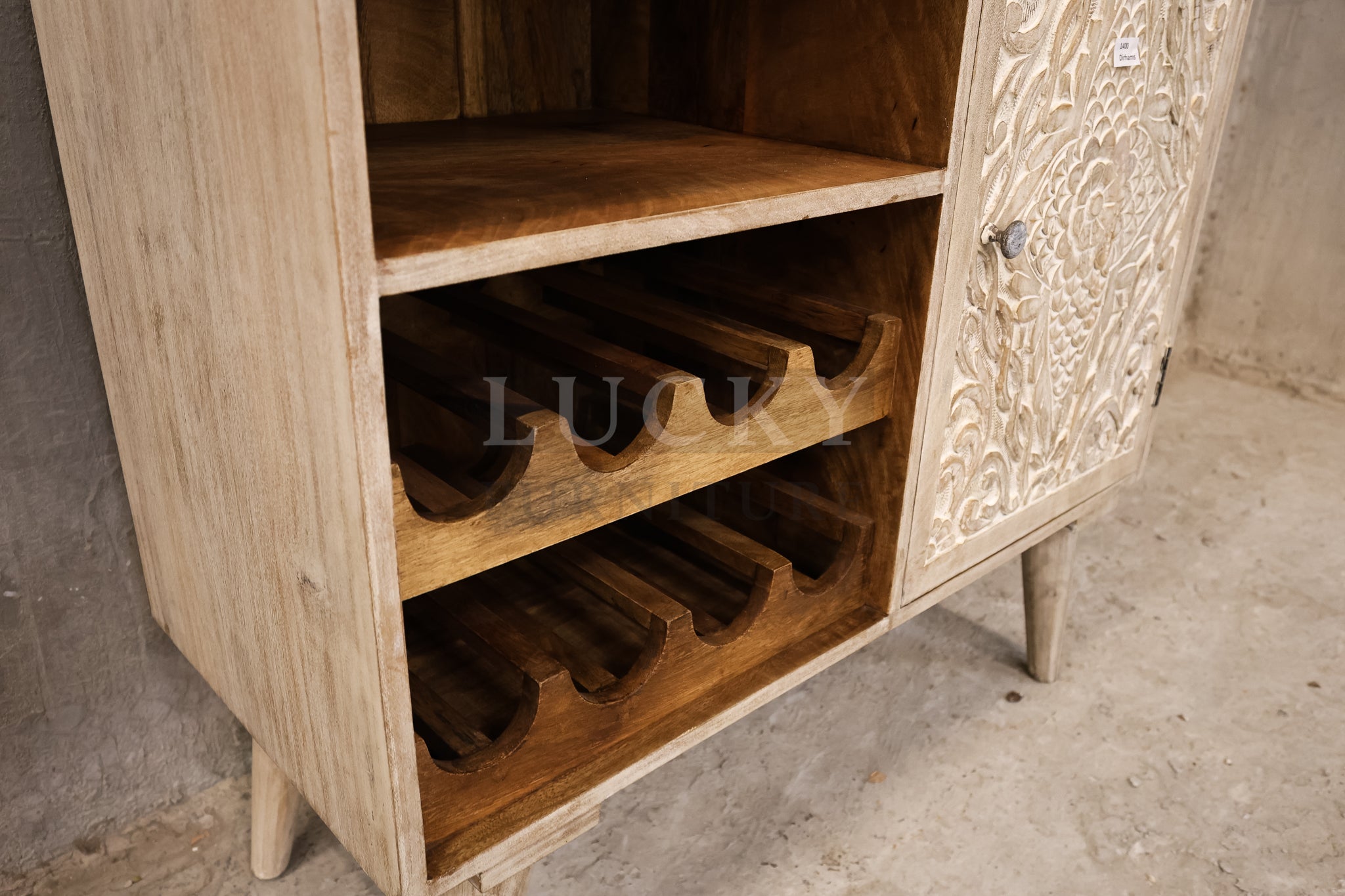 Cavred whitewashed wooden bar.