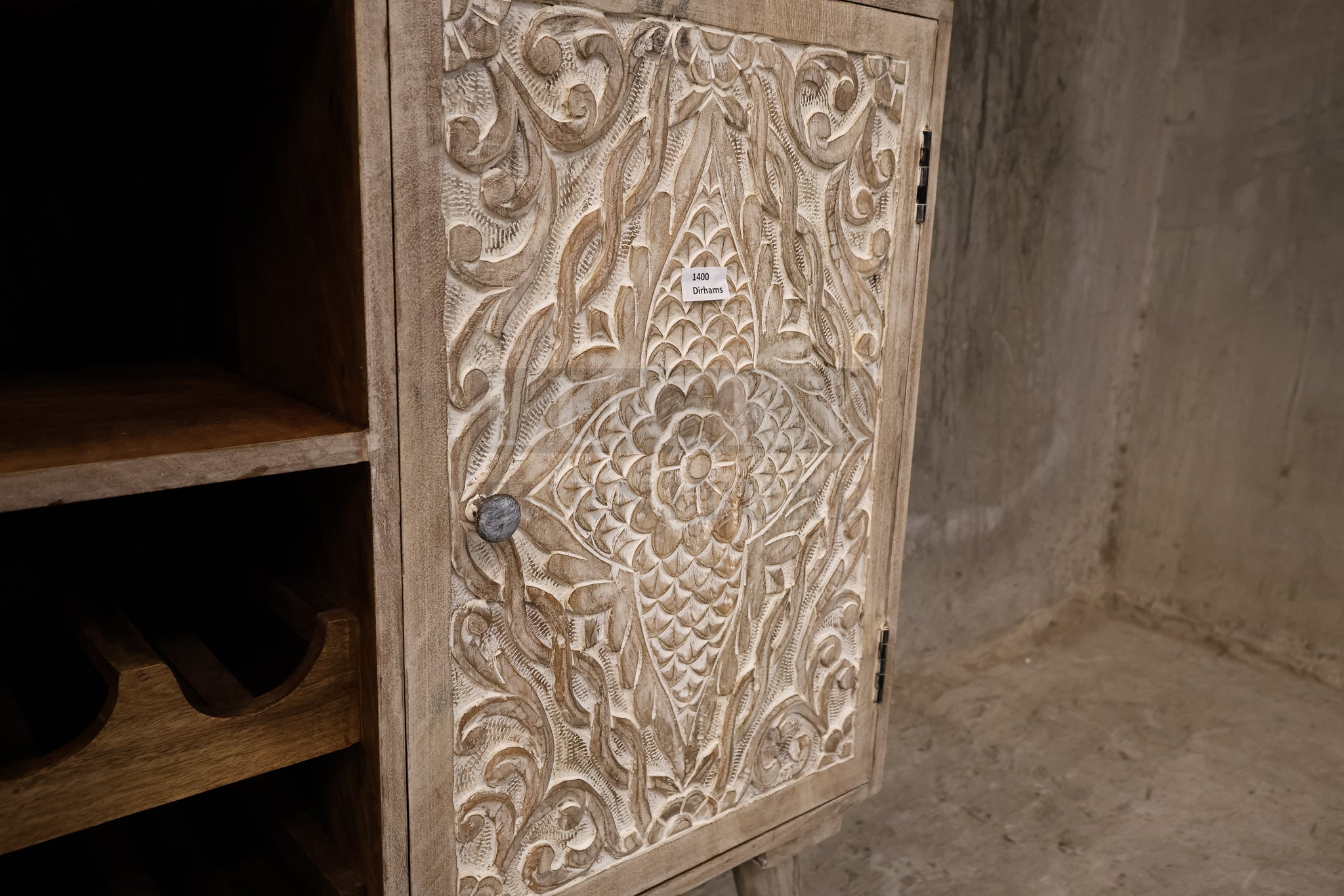 Cavred whitewashed wooden bar.