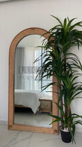 Rattan arch mirror