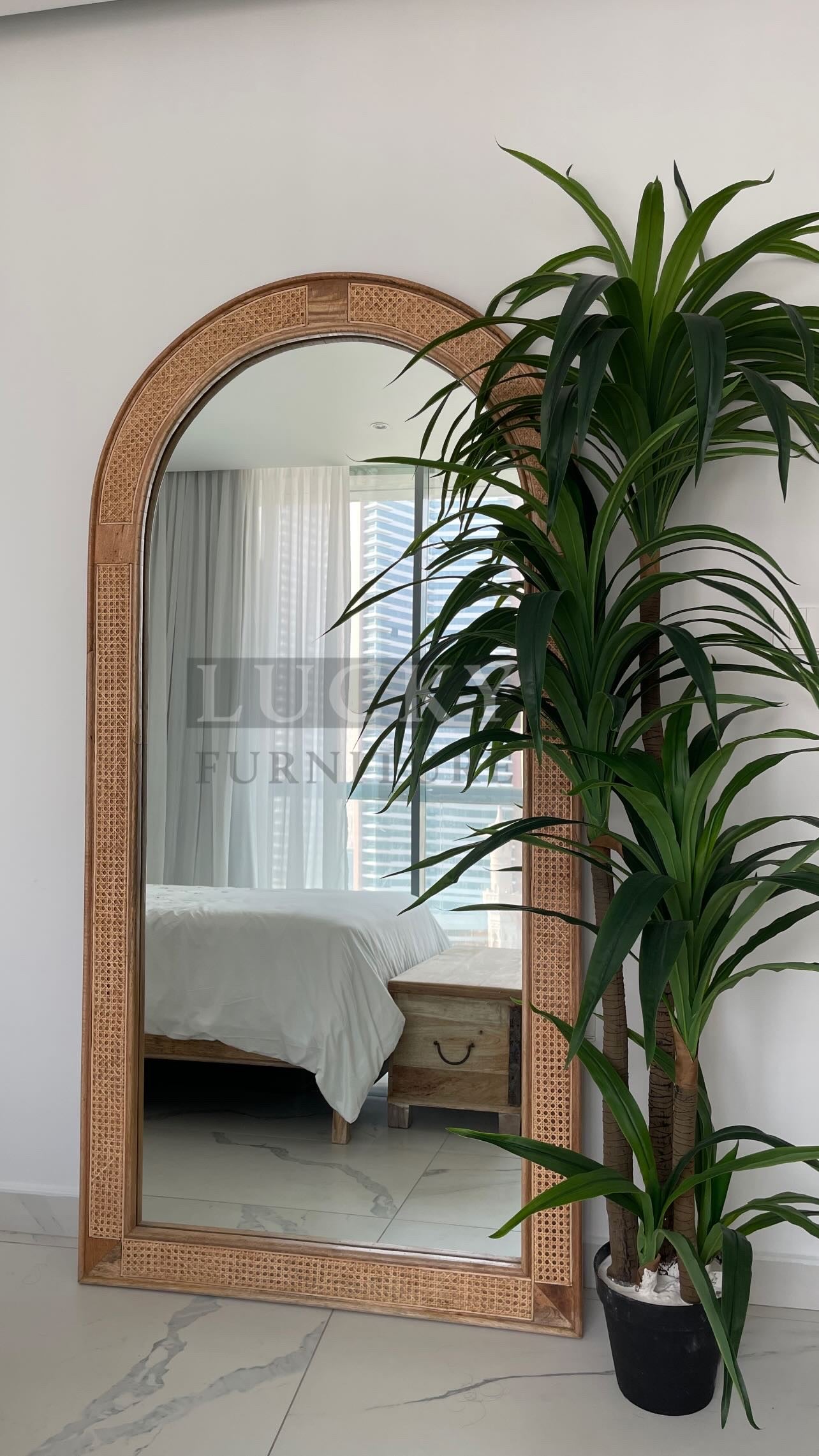 Rattan arch mirror