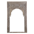 Carved archway mirror.