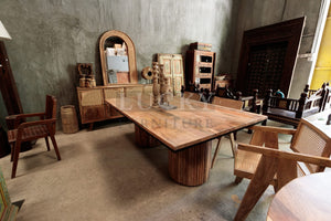 Fluted pedestal base dining table