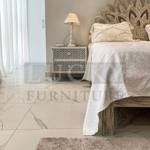 Carved bed
