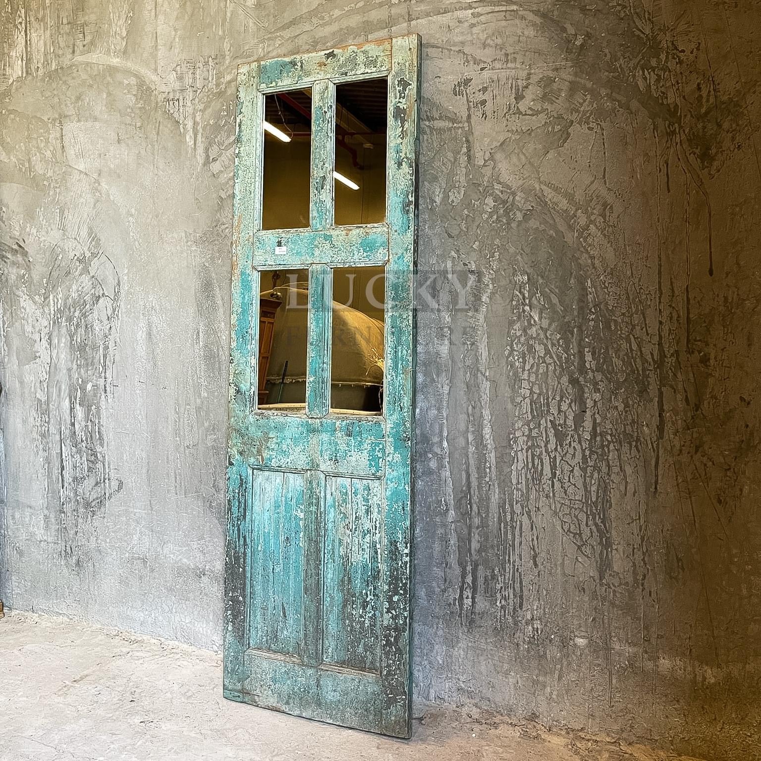 Vintage door panel converted into mirror