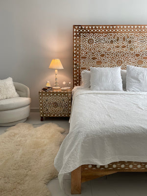 Carved bed