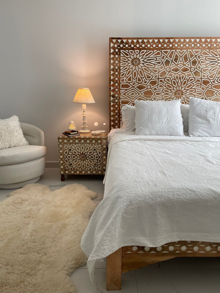 Carved bed
