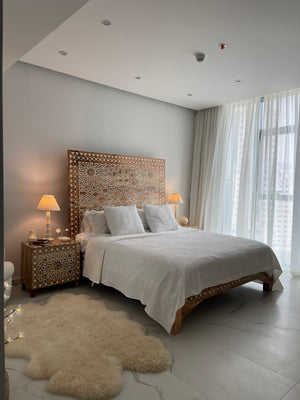 Carved bed