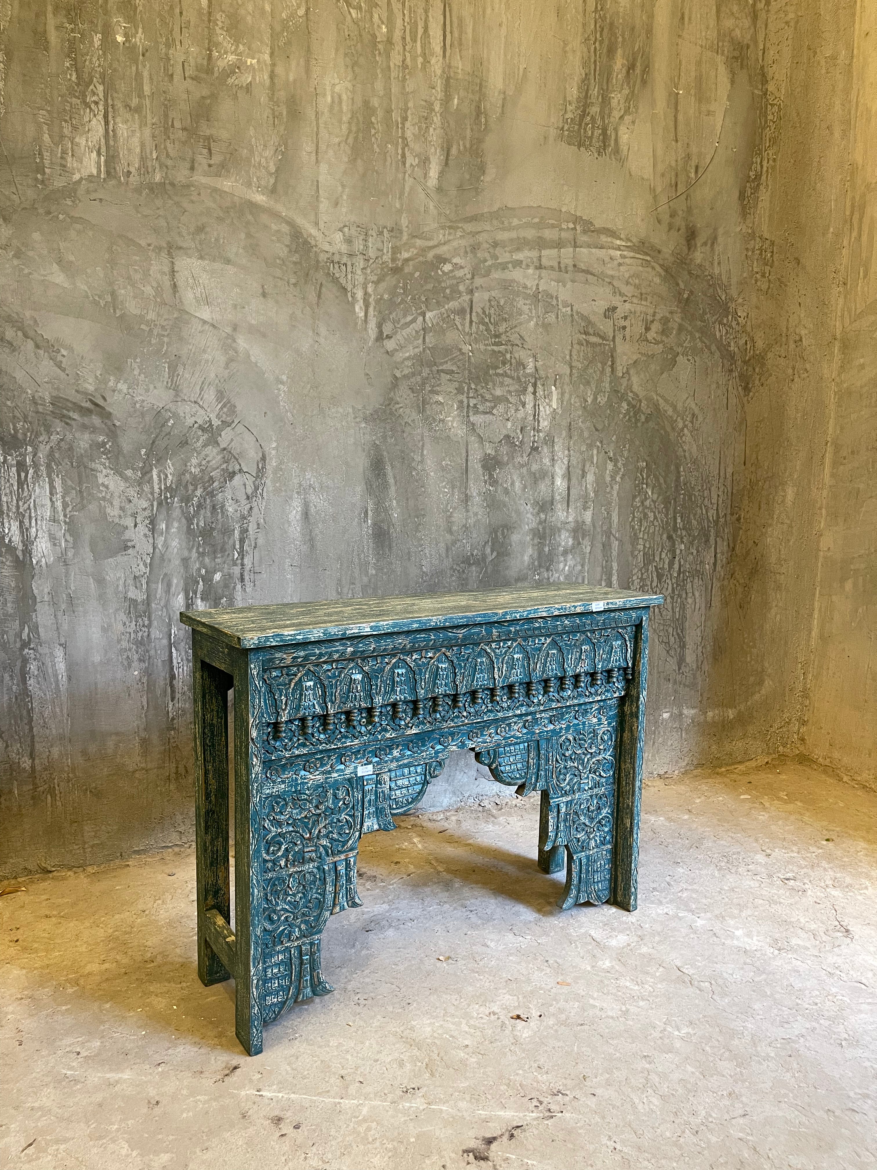 Carved console