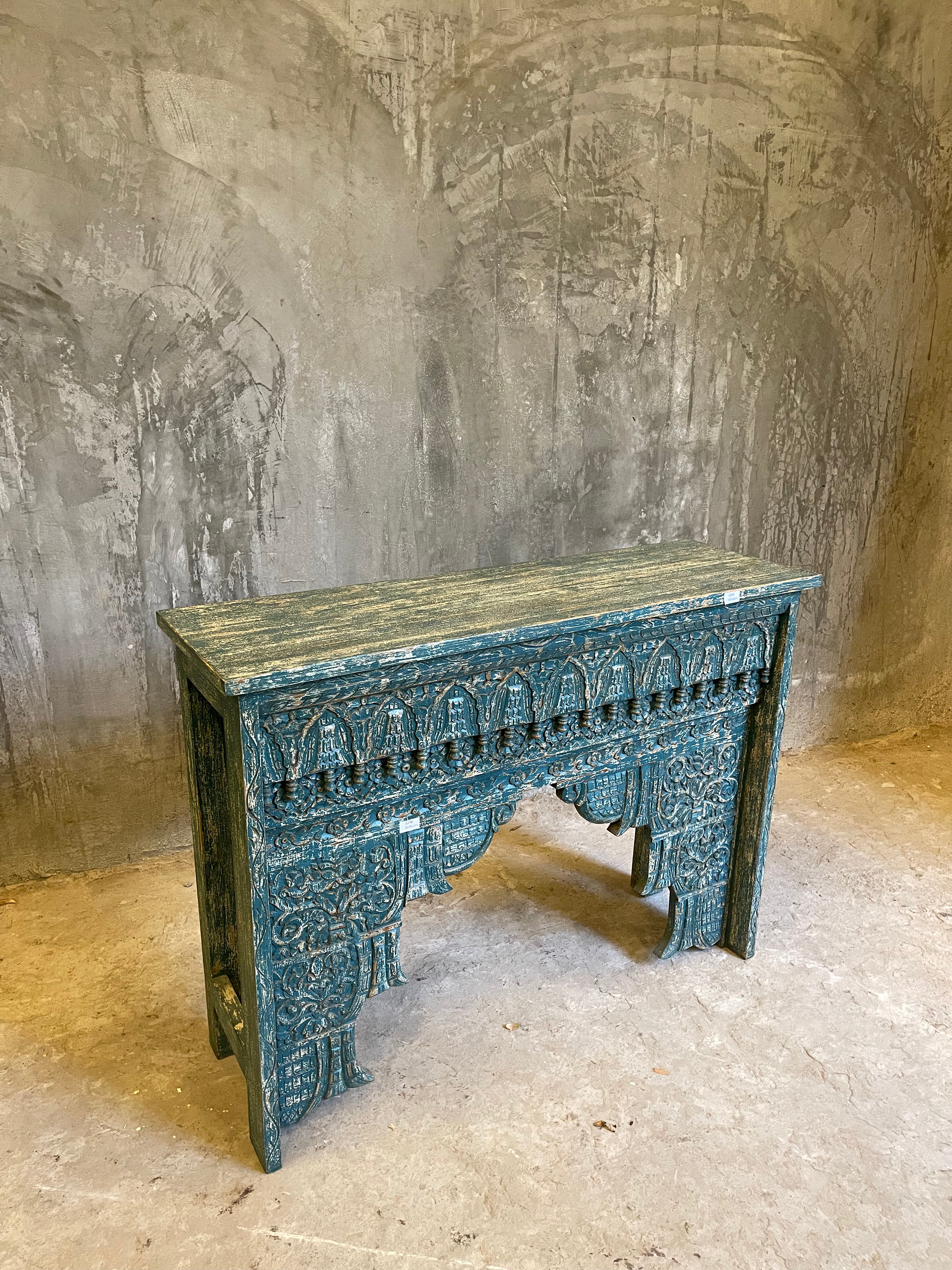 Carved console