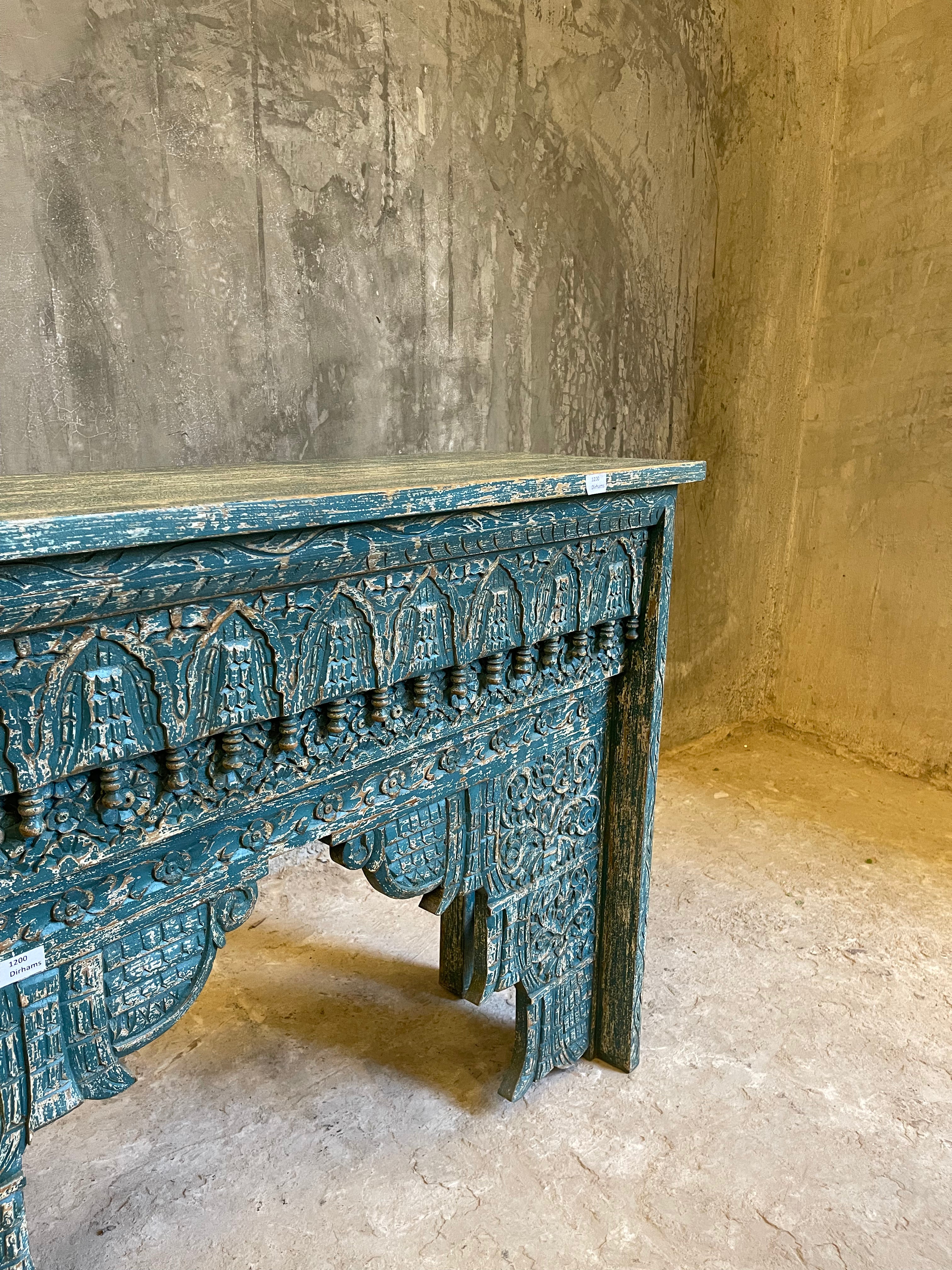 Carved console