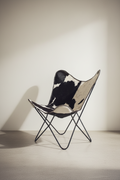 Black and white leather butterfly chair