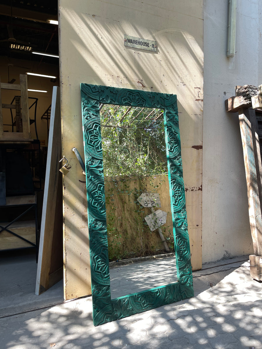 Green carved mirror