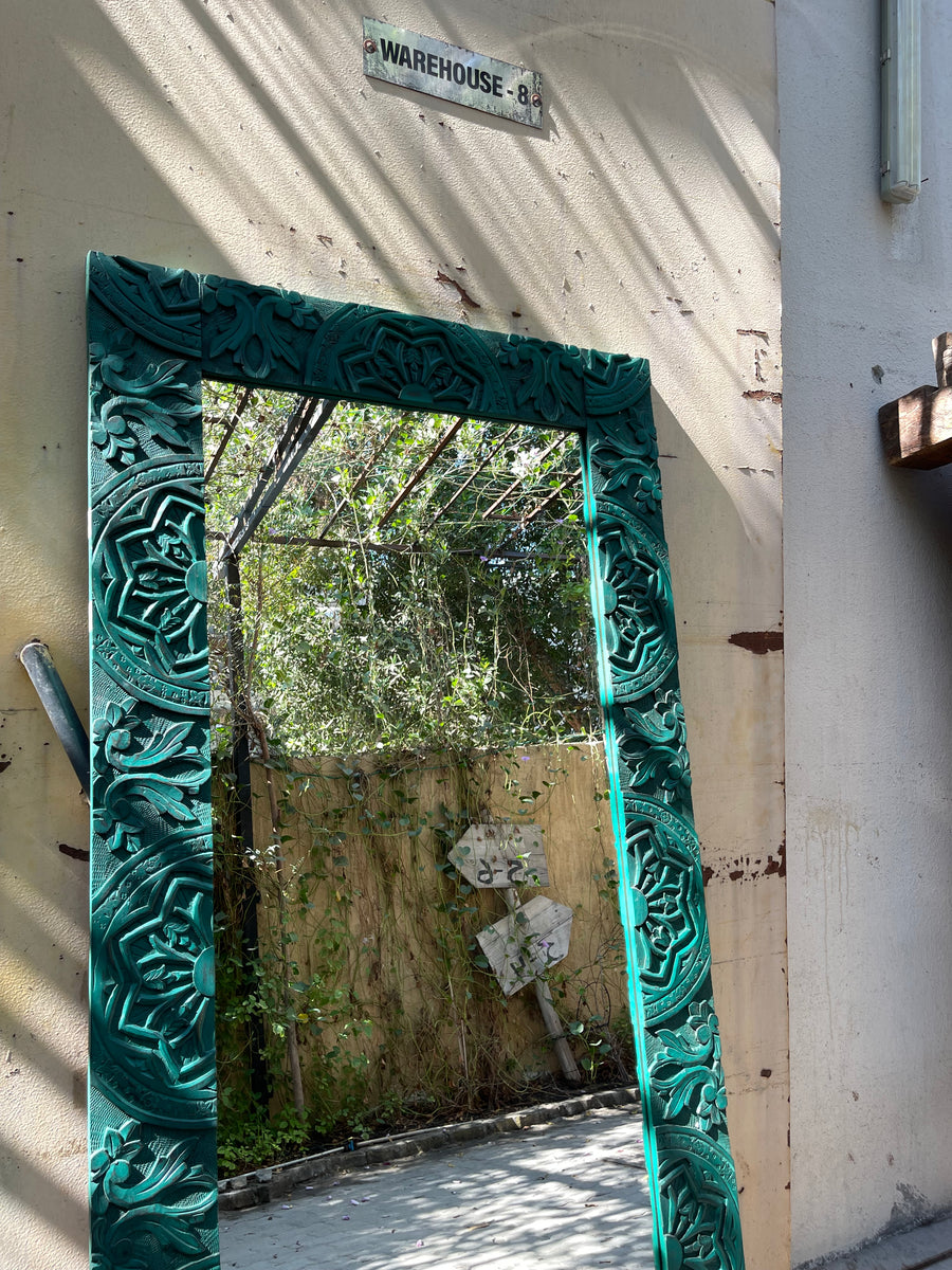 Green carved mirror