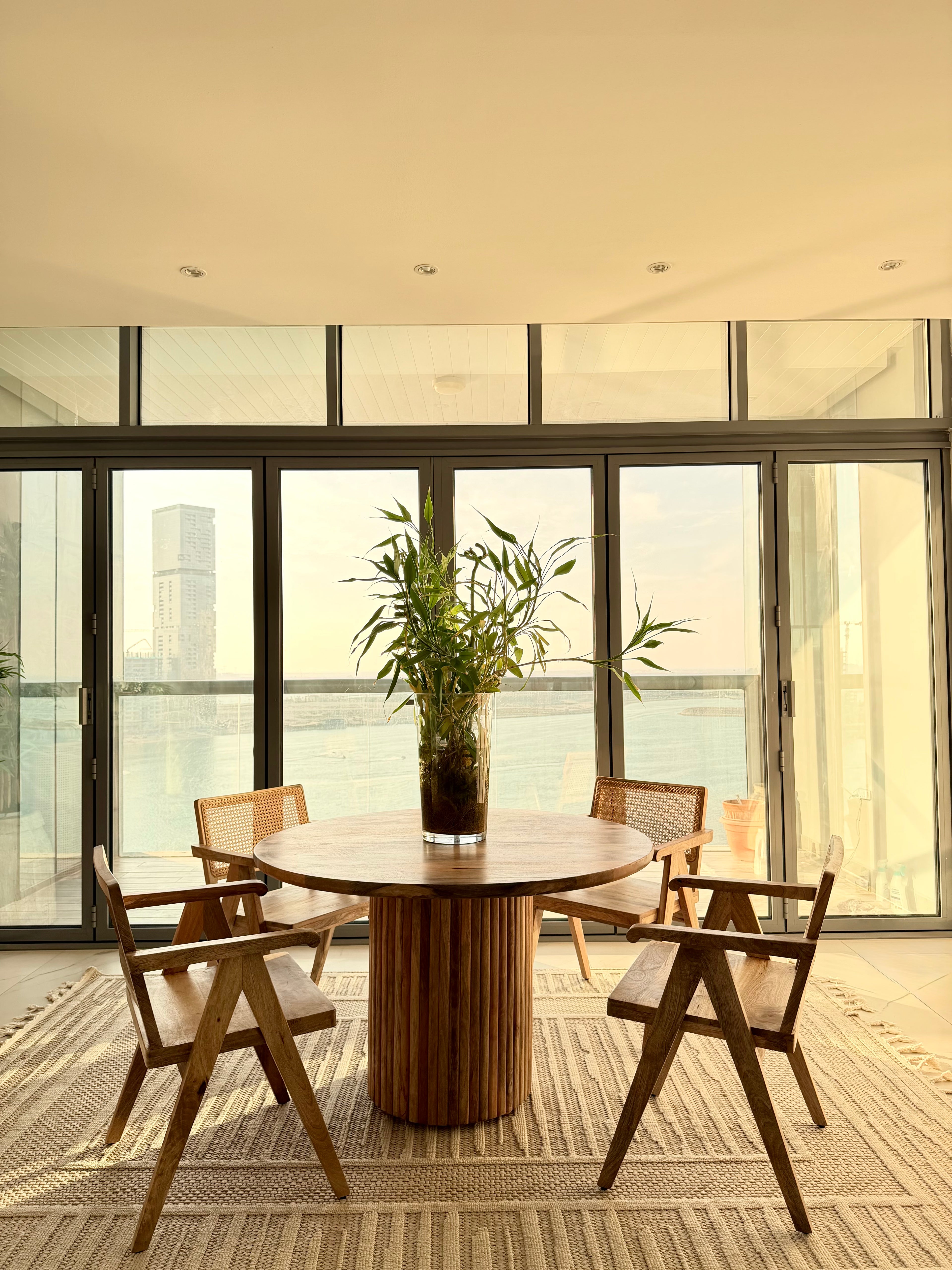 Mango wood fluted base dining table