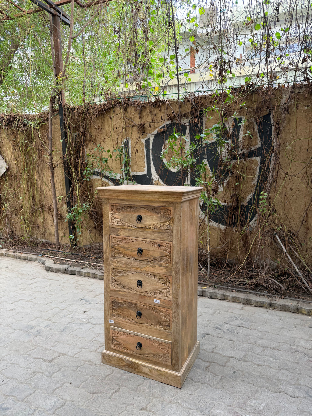 Carved narrow drawchest