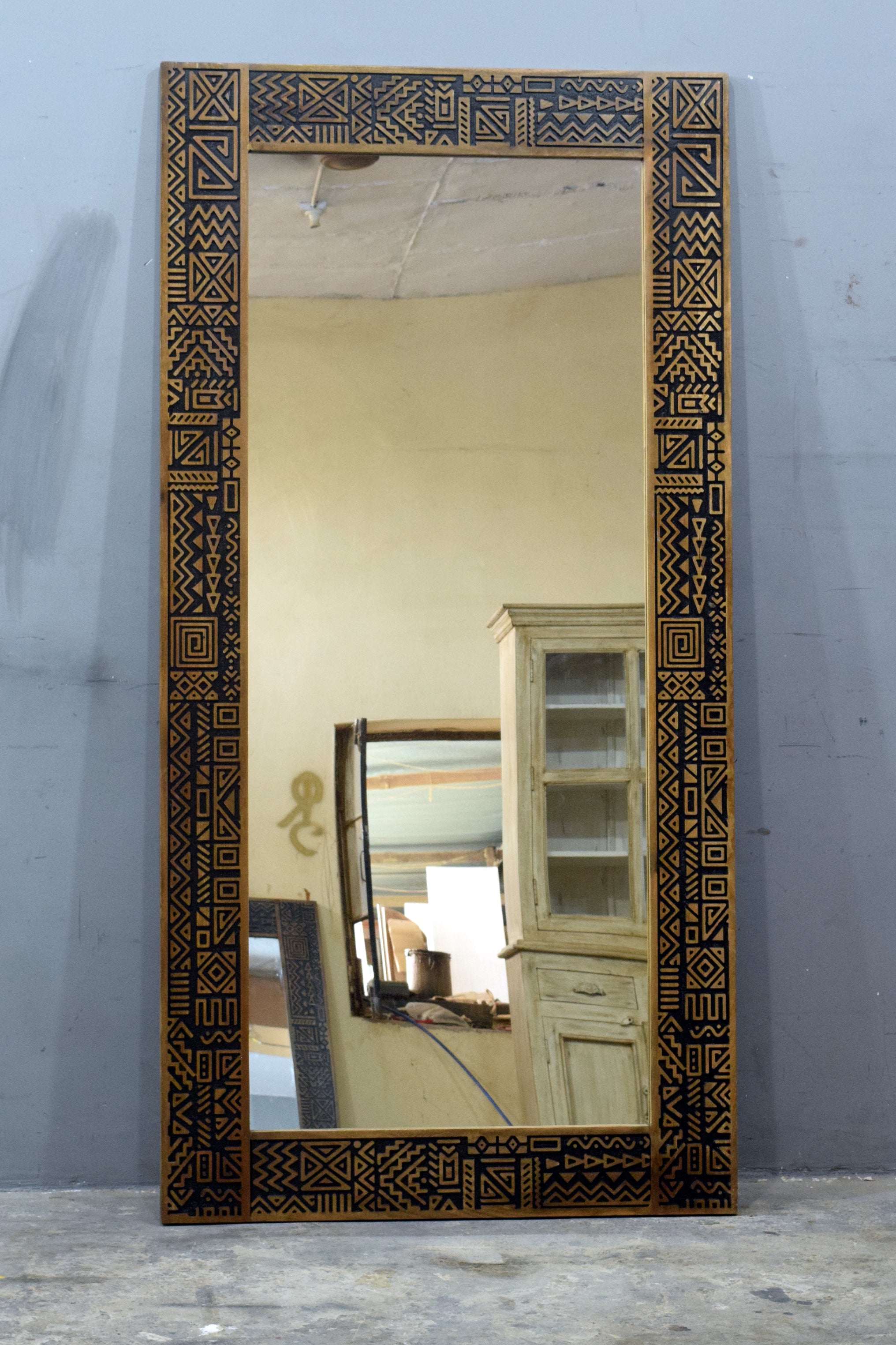 Tribal mirror