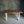 Load image into Gallery viewer, Live Edge Acacia Wood Table with White Metal Legs
