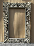 Carved mirror