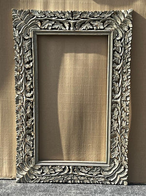 Carved mirror
