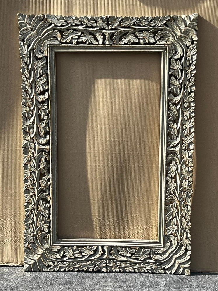 Carved mirror
