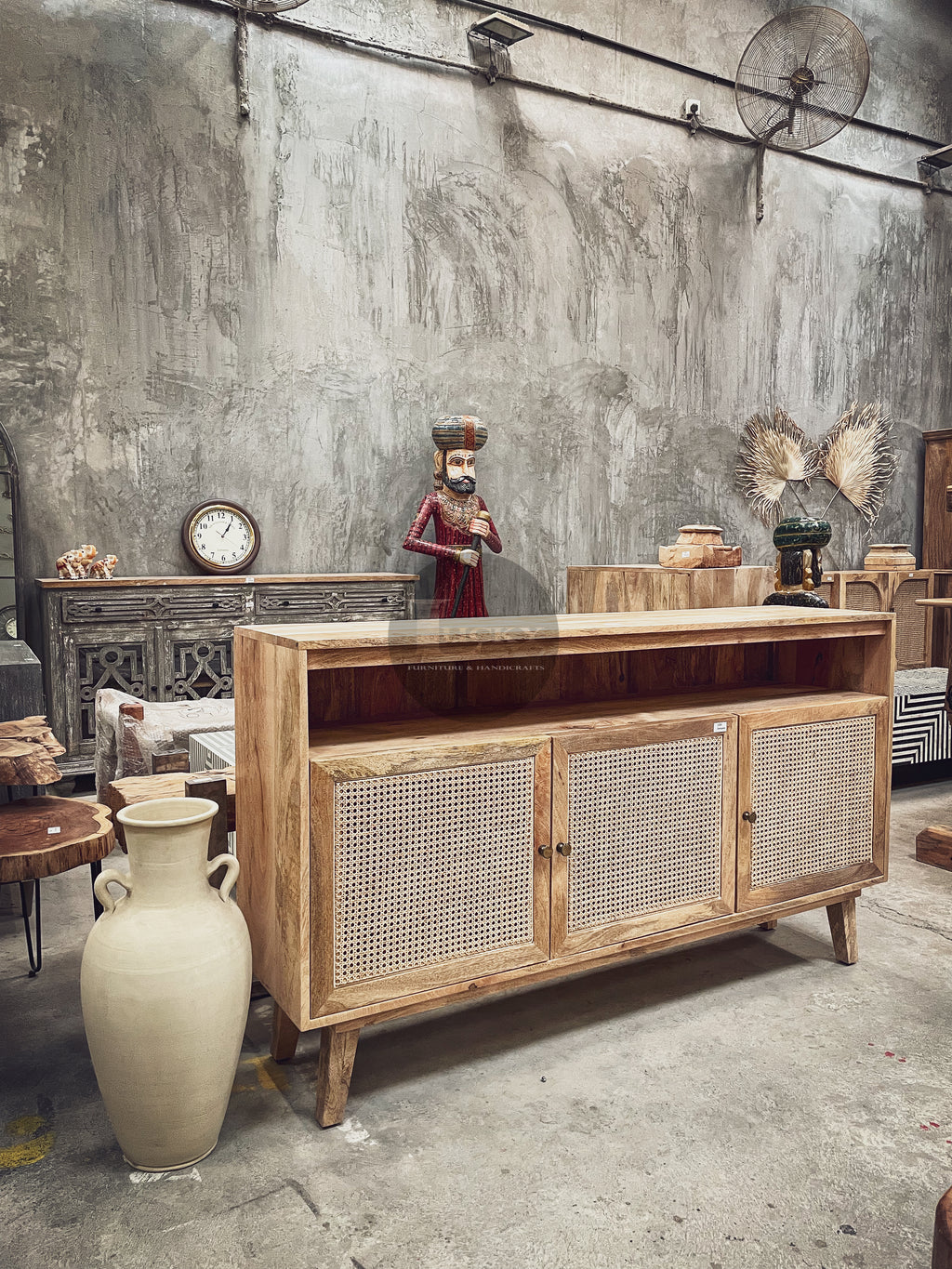 Rattan and mango wood 3 door sideboard.