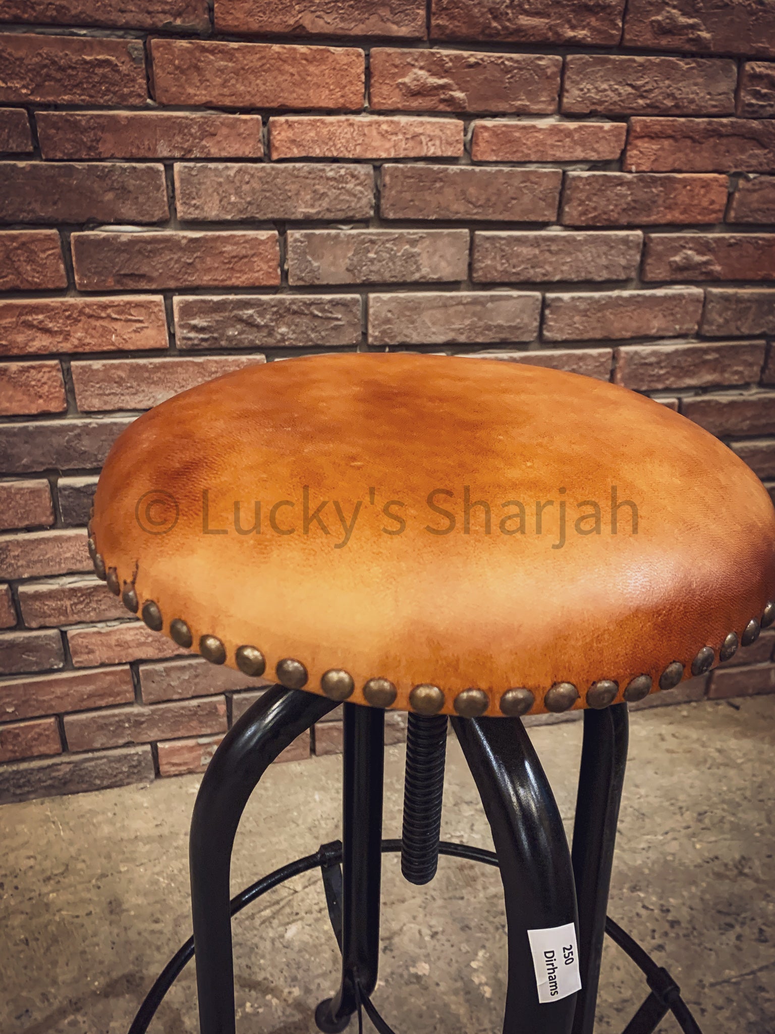 Tan brown brass studded leather bar stool | Lucky Furniture & Handicrafts.