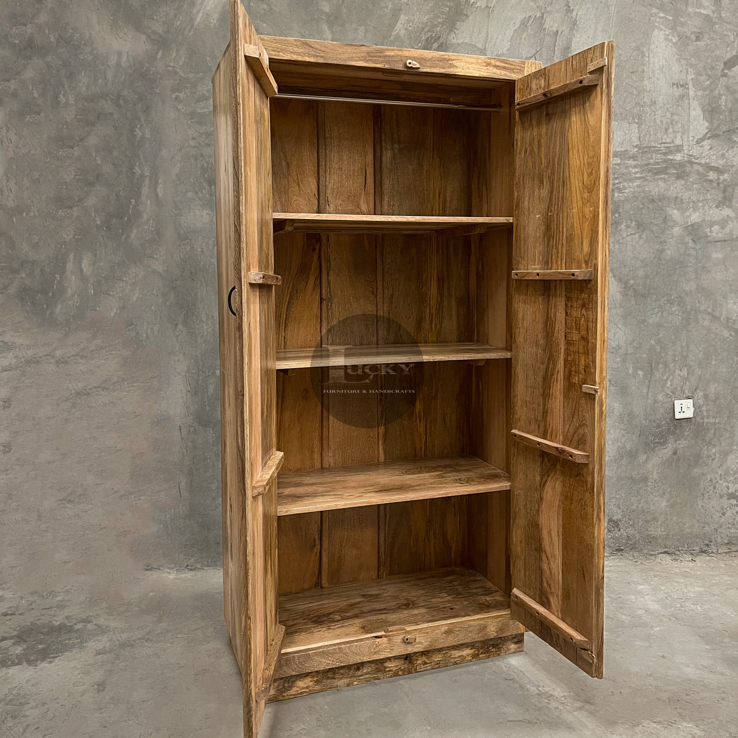 Carved cabinet with white painted inlay.