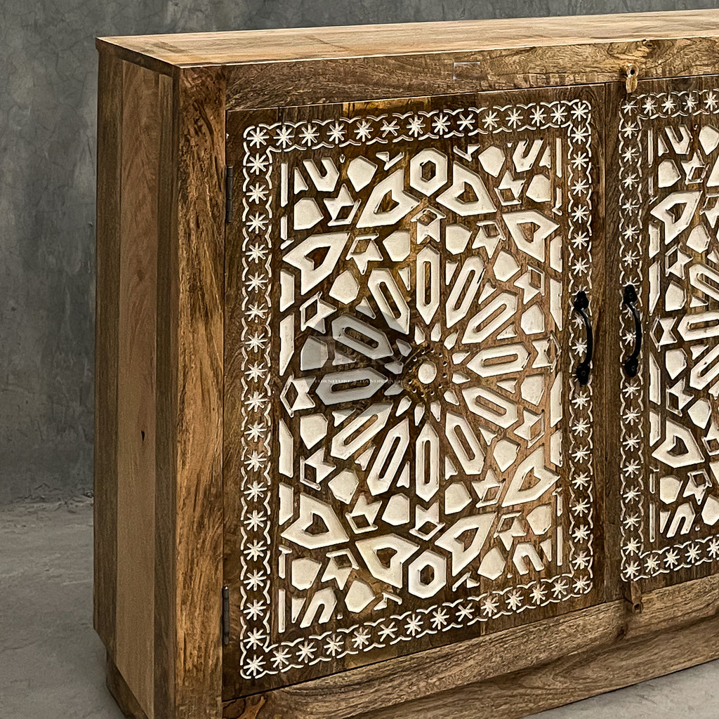 Carved sideboard cabinet with white painted inlay.