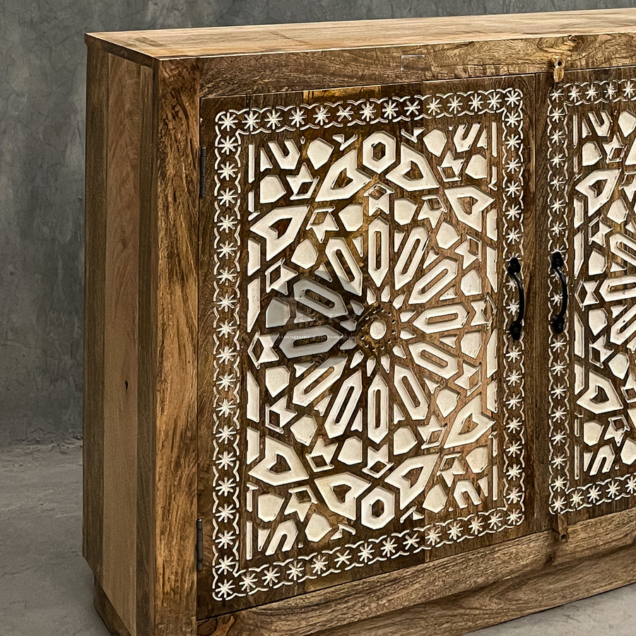 Carved sideboard cabinet with white painted inlay.
