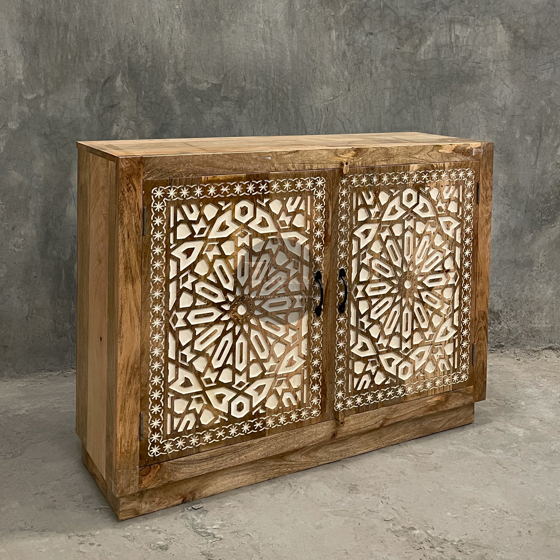 Carved sideboard cabinet with white painted inlay.