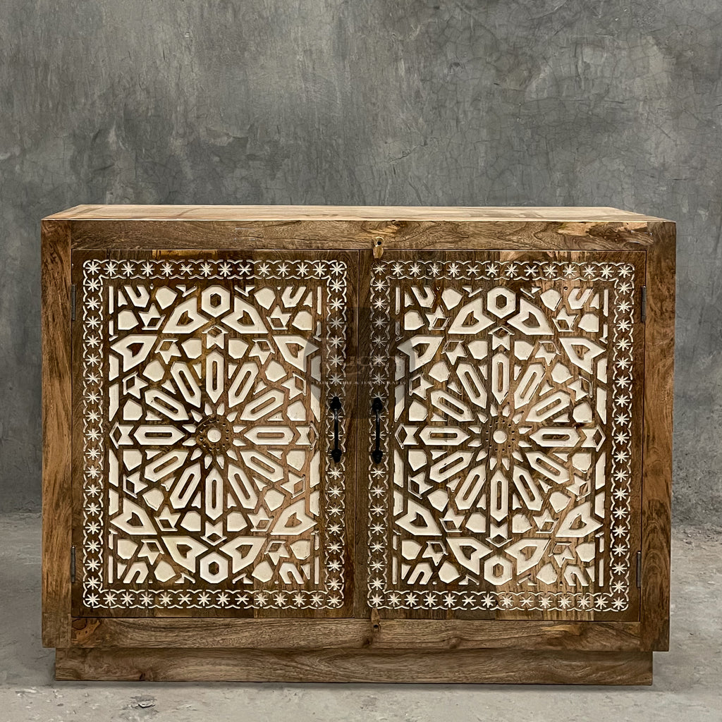 Carved sideboard cabinet with white painted inlay.