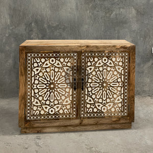 Carved sideboard cabinet with white painted inlay.